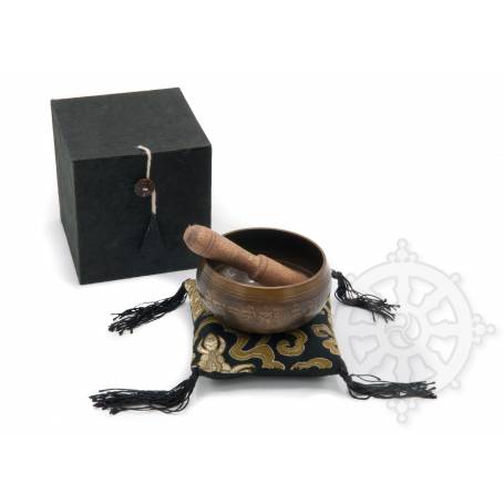 Idée cadeau incluant un bol de méditation noir avec coussin coordonné et stick !