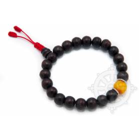 Malas pour poignet composé de 20 perles bois de rose(8mm) 1 ambre (10 mm)