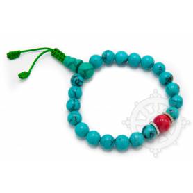 Malas pour poignet composé de 20 perles turquoise(8mm) 1 corail(10mm)