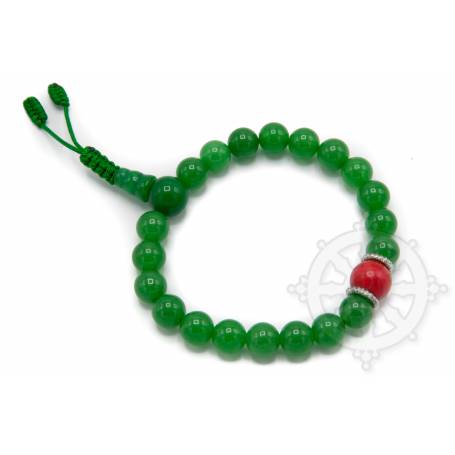 Malas pour poignet composé de 20 perles jade(8mm) 1 corail(10mm)